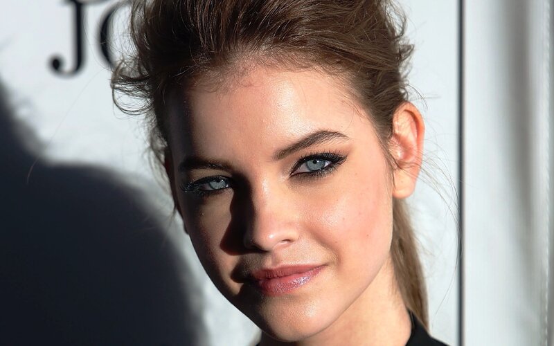 woman with blue eyes and makeup