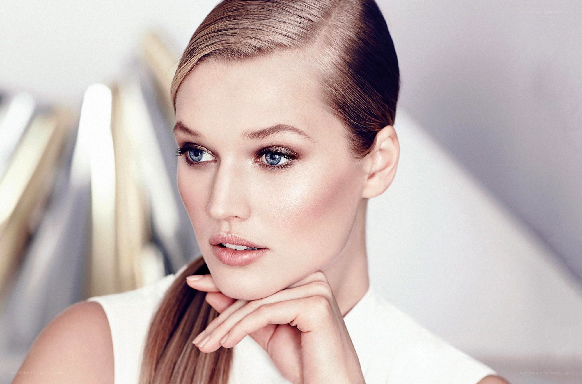 woman with blue eyes and makeup
