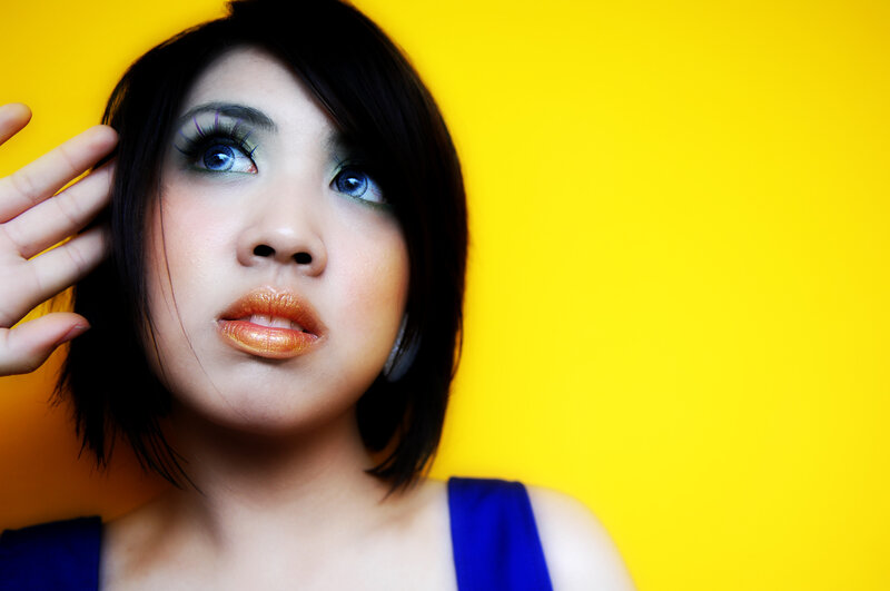 woman with blue eyes and makeup
