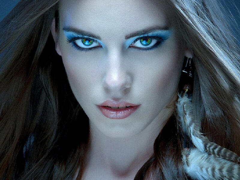 woman with blue eyes and makeup