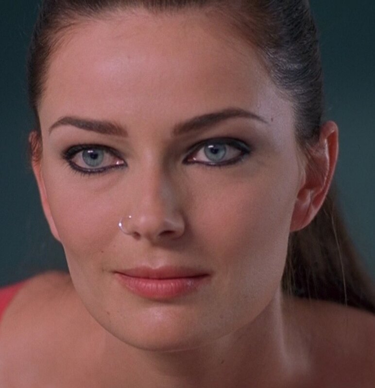 woman with blue eyes and nose ring