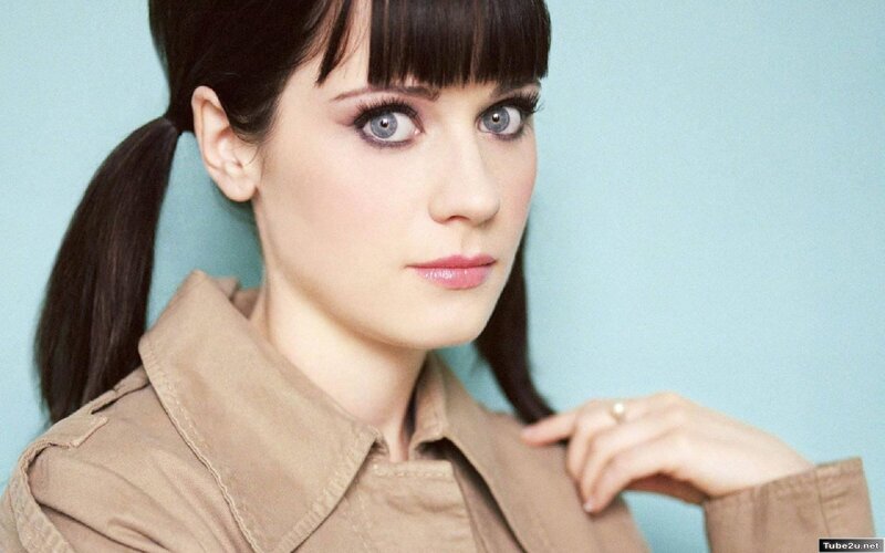 woman with blue eyes and pigtails