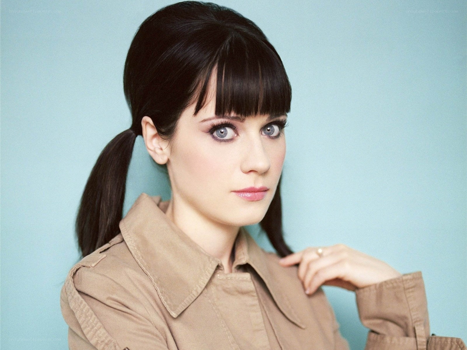 woman with blue eyes and pigtails