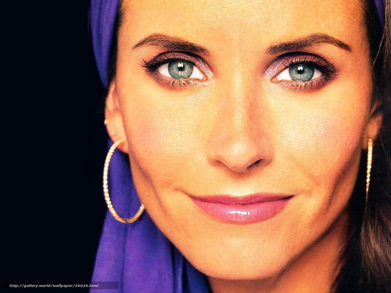 woman with blue eyes and purple headscarf