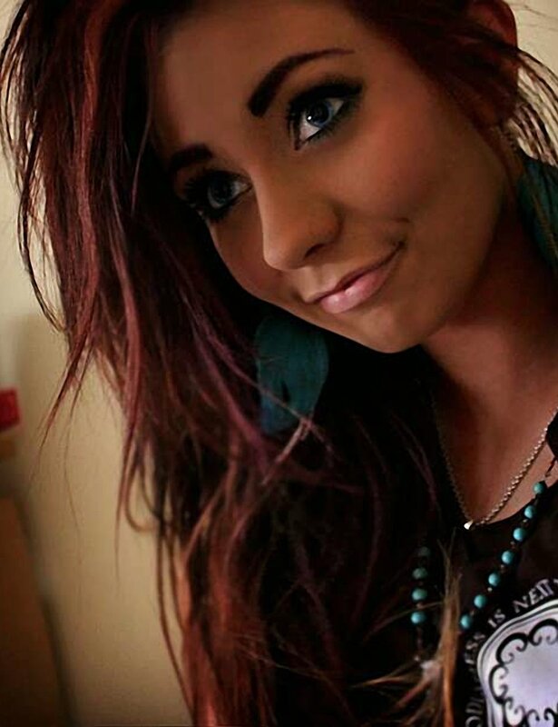 woman with blue eyes and red hair