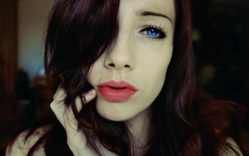 woman with blue eyes and red hair