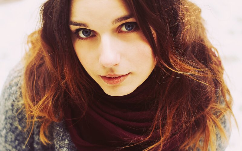 woman with blue eyes and red hair