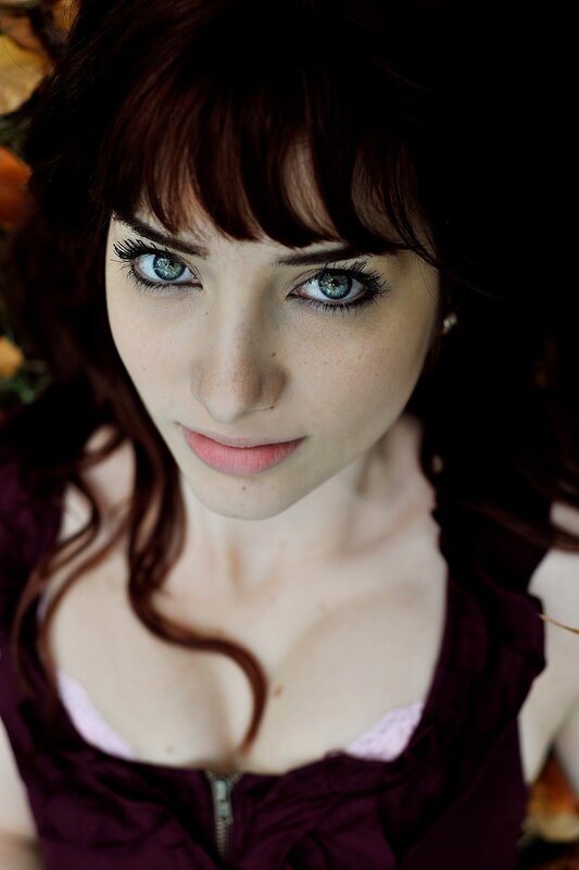 woman with blue eyes and red hair
