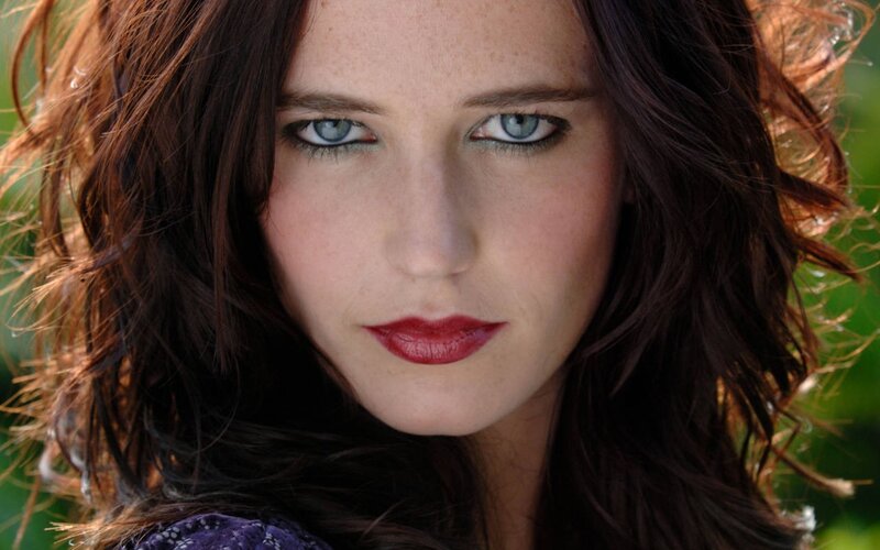 woman with blue eyes and red hair