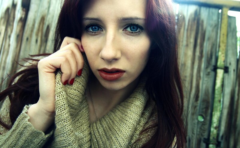 woman with blue eyes and red hair