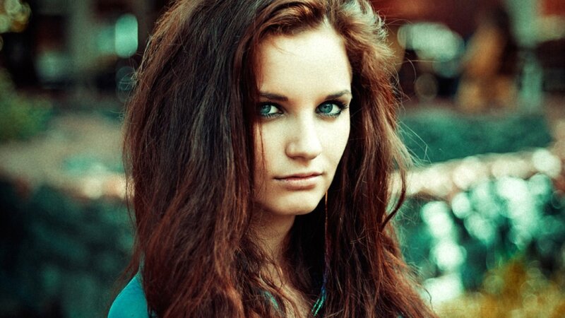 woman with blue eyes and red hair