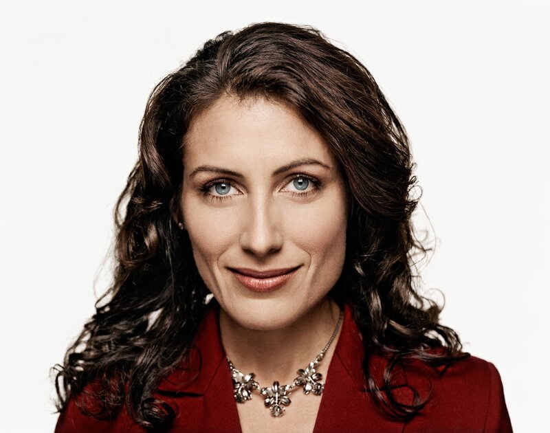 woman with blue eyes and red jacket