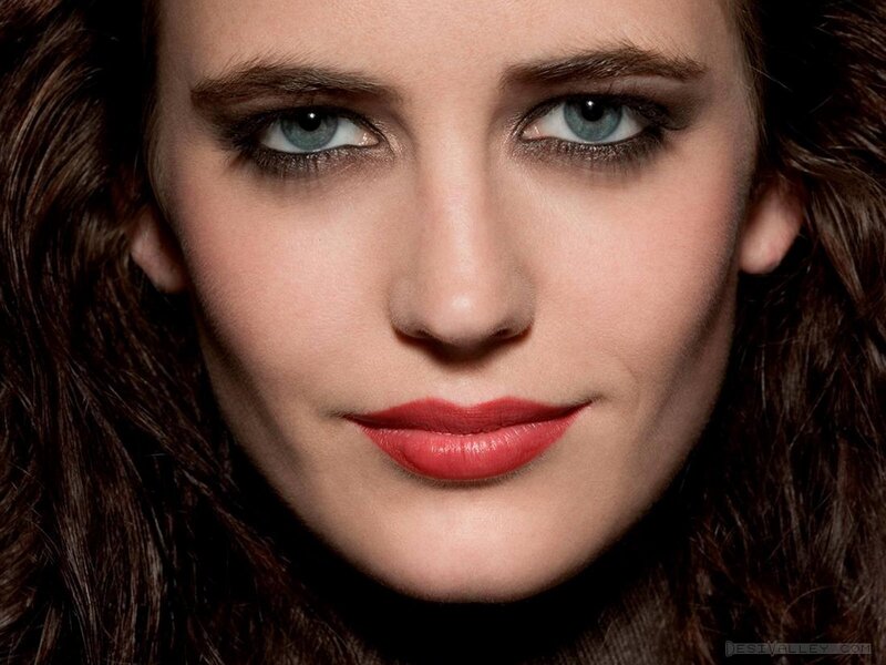 woman with blue eyes and red lips