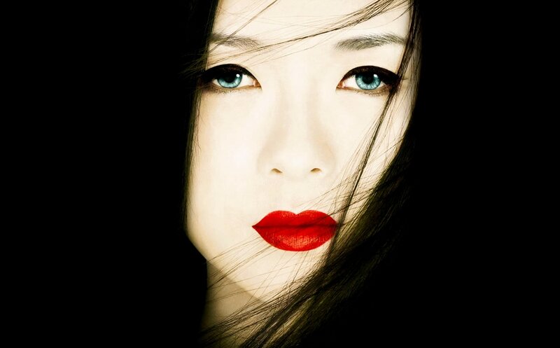 woman with blue eyes and red lips