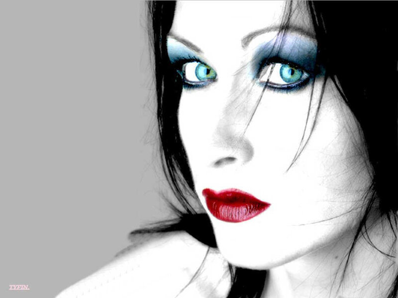 woman with blue eyes and red lips