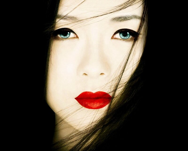 woman with blue eyes and red lips