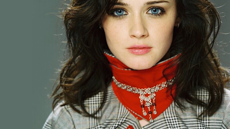 woman with blue eyes and red scarf