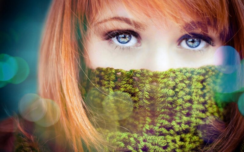 woman with blue eyes and scarf