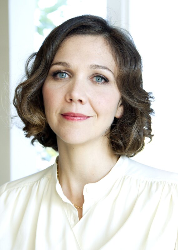 woman with blue eyes and short brown hair