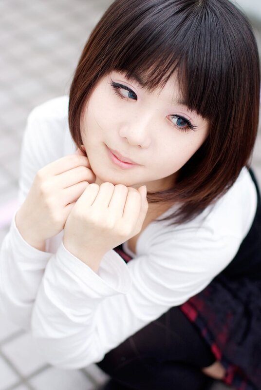 woman with blue eyes and short hair