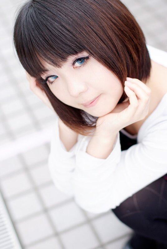 woman with blue eyes and short hair