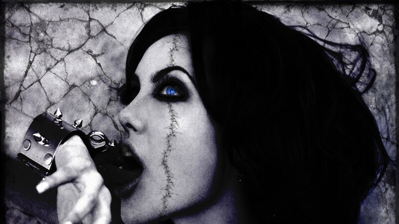 woman with blue eyes and stitches