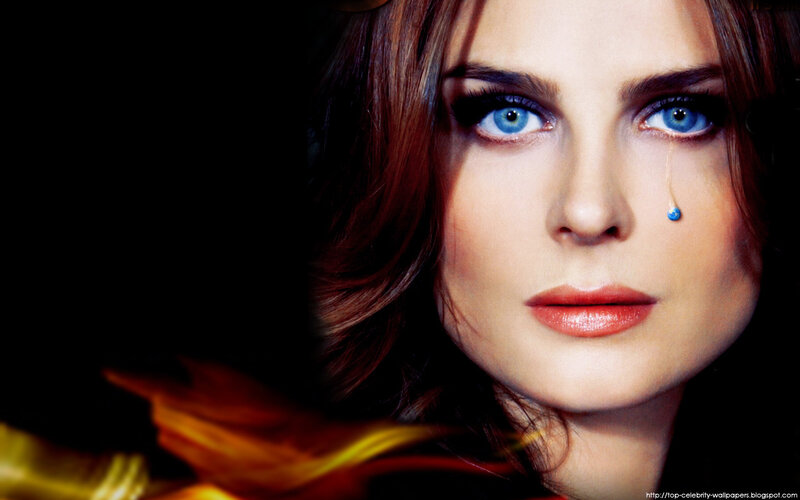 woman with blue eyes and tear
