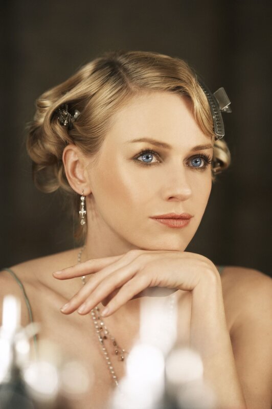 woman with blue eyes and vintage hair