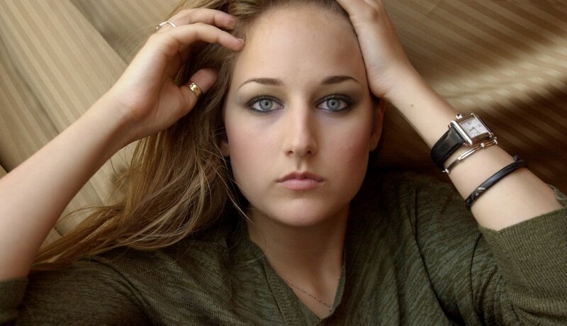 woman with blue eyes and watch
