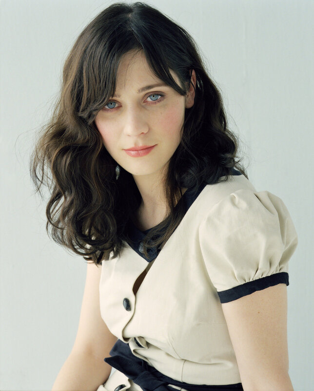 woman with blue eyes and wavy hair