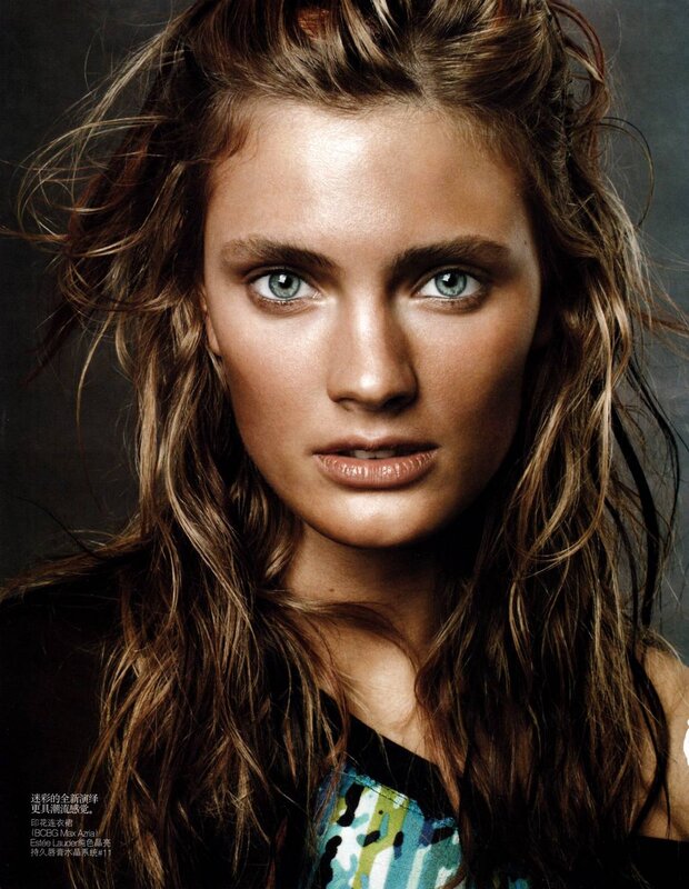 woman with blue eyes and wavy hair