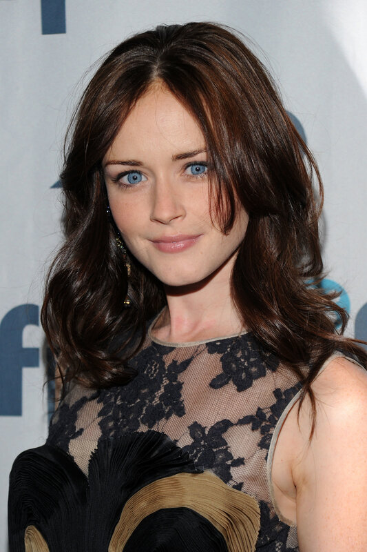 woman with blue eyes at event
