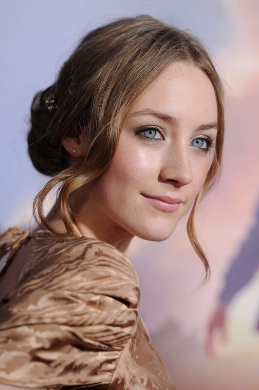 woman with blue eyes at event