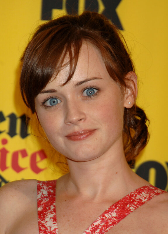 woman with blue eyes at event