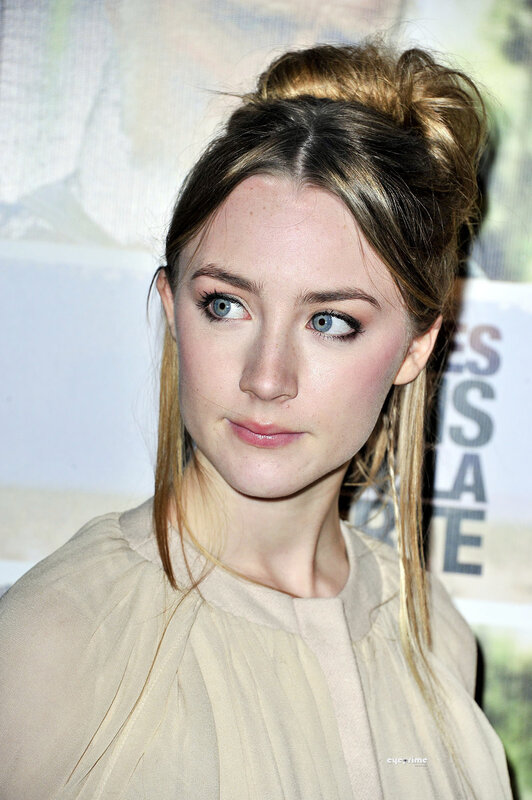 woman with blue eyes at event