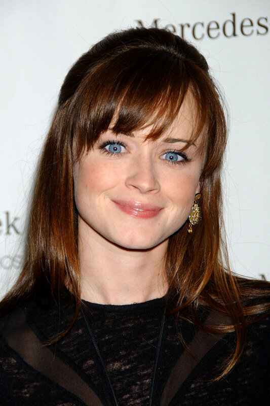 woman with blue eyes at event