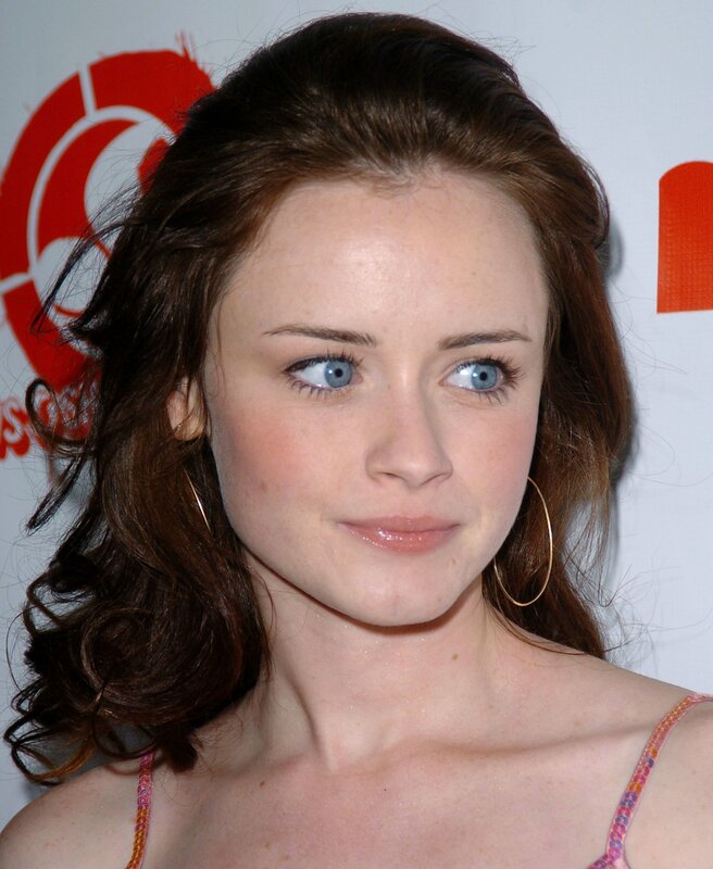 woman with blue eyes at event