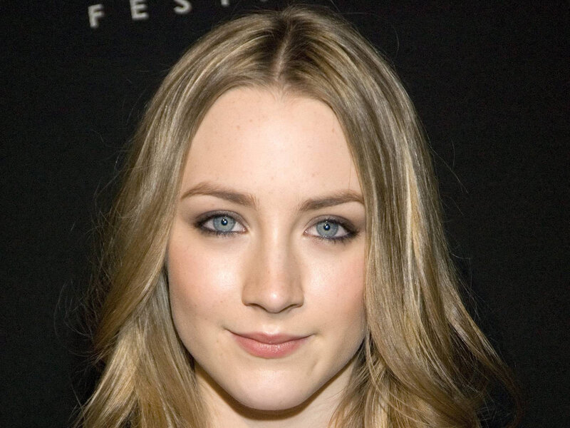 woman with blue eyes at event