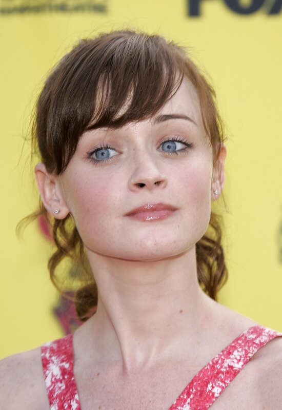 woman with blue eyes at event
