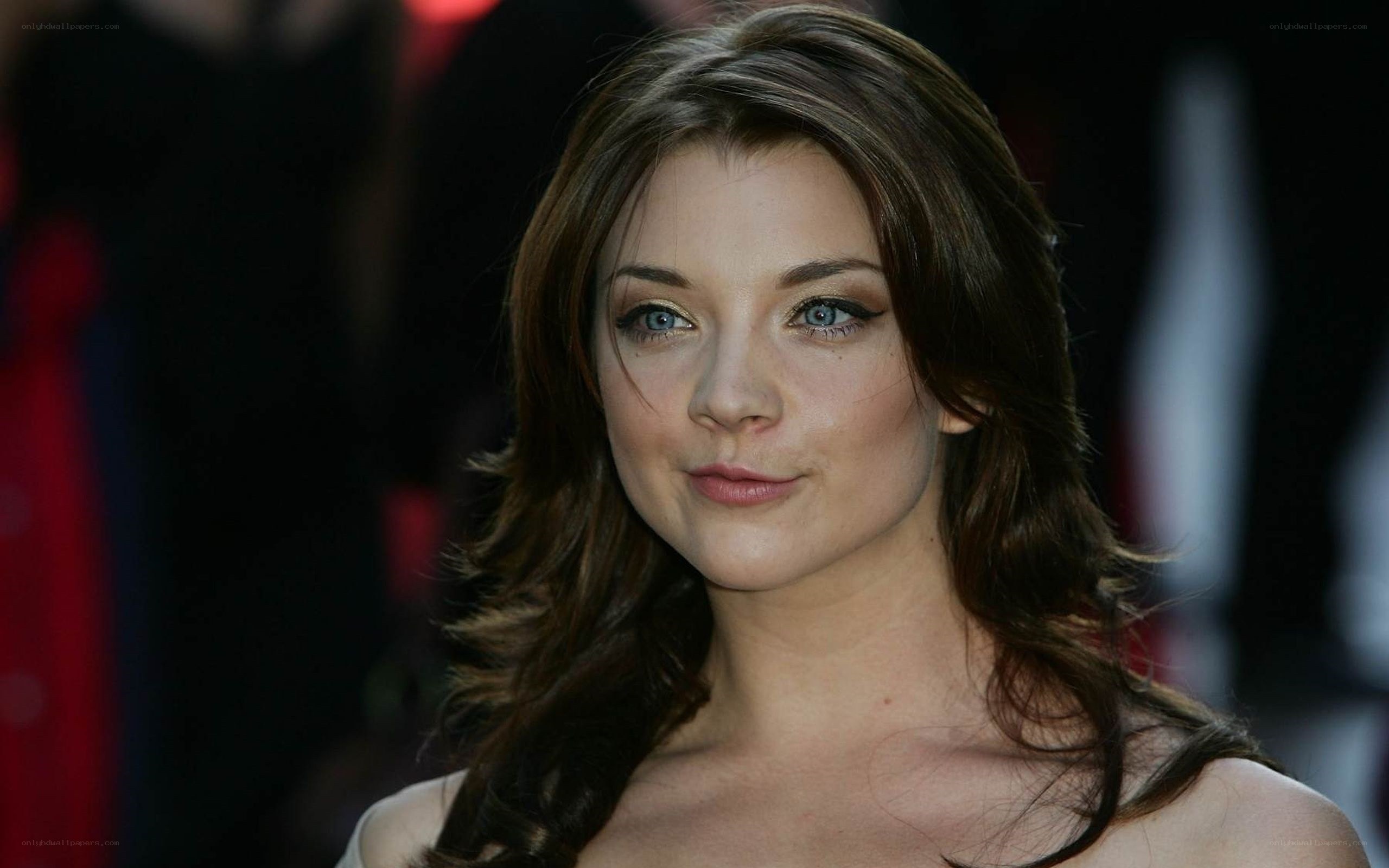 woman with blue eyes at event