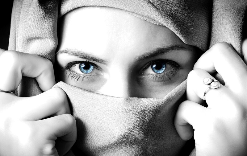 Woman with Blue Eyes — Black, Dramatic, Photograph, Hands, Headscarf