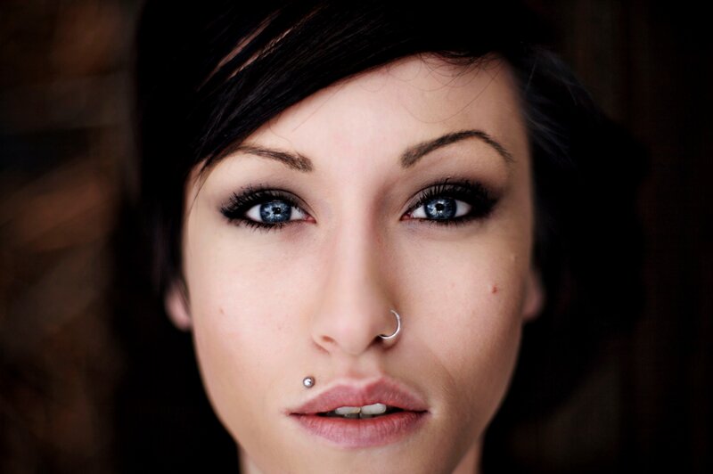 Woman with Blue Eyes — Black, Intense, Photograph, Nose Ring