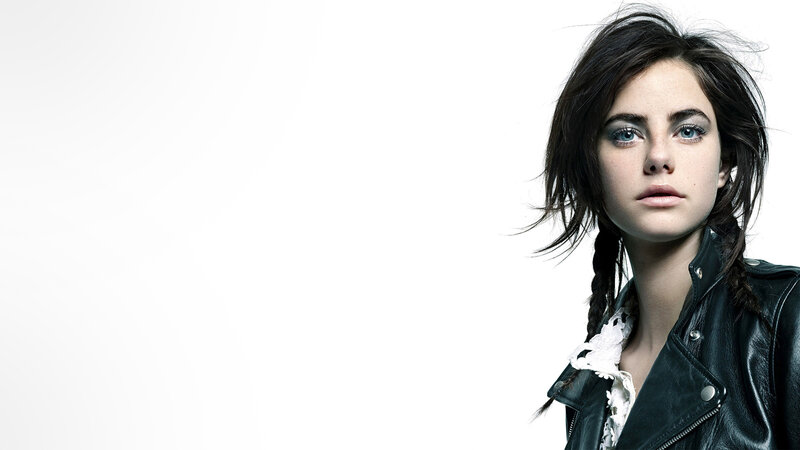 Woman with Blue Eyes — Black, Serious, Photograph, Black Leather Jacket