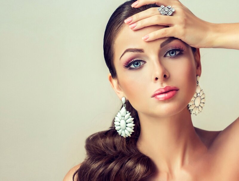 Woman with Blue Eyes — Brown, Confident, Photograph, Earrings