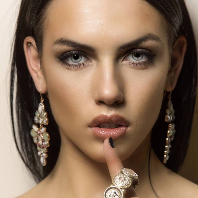 Woman with Blue Eyes — Brown, Dramatic, Photograph, Earrings, Rings