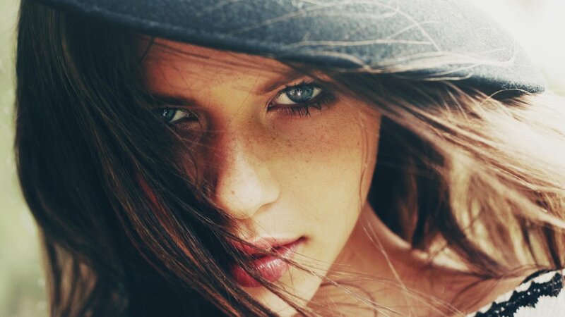 Woman with Blue Eyes — Brown, Dramatic, Photograph, Hat, Hair