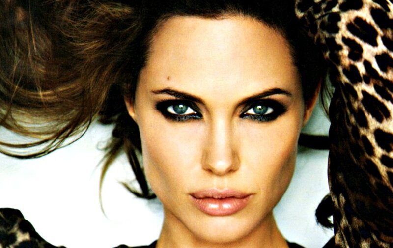 Woman with Blue Eyes — Brown, Intense, Photograph, Leopard Print