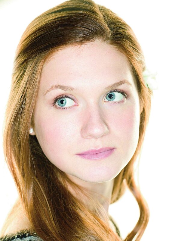 Woman with Blue Eyes — Brown, Neutral, Photograph, Earring, Flower