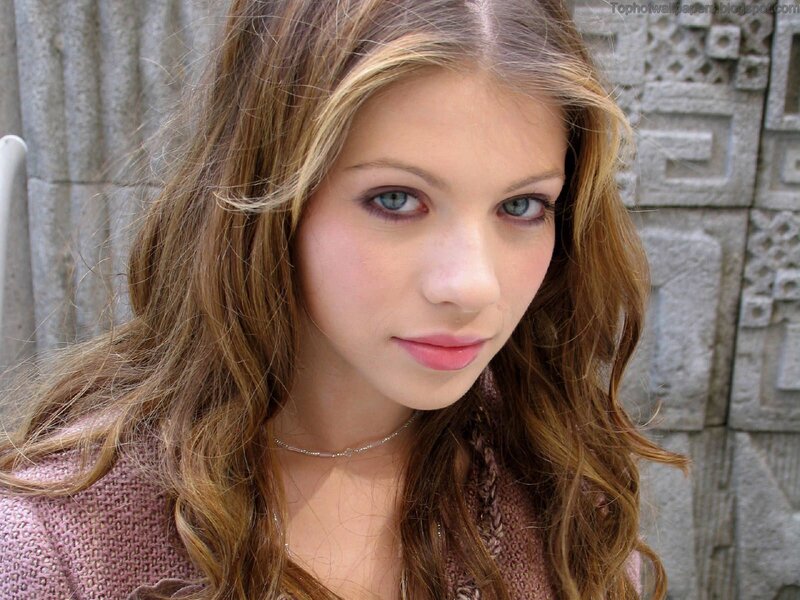 Woman with Blue Eyes — Brown, Neutral, Photograph, Stone Wall