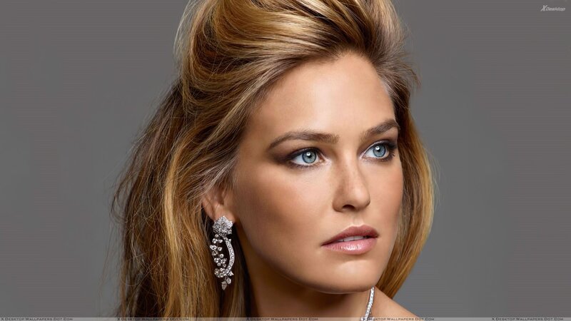 Woman with Blue Eyes — Brown, Serious, Photograph, Earrings, Necklace